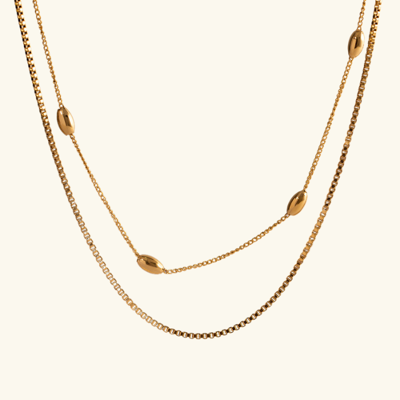 Collier Multirangs Femme – Perles Ovales en Acier Inoxydable Doré Style Moderne